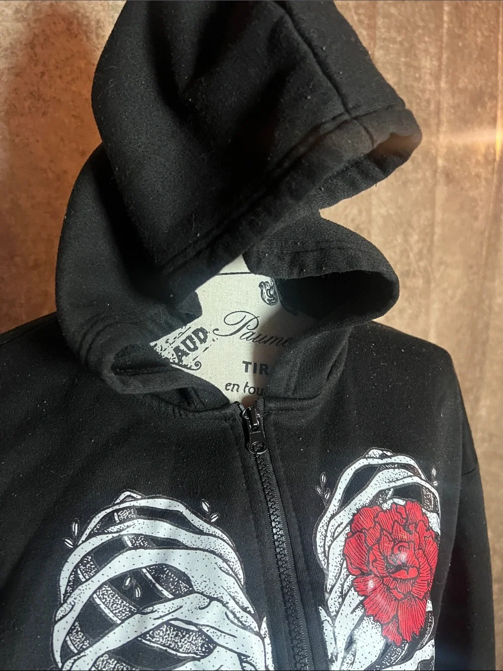 SHEIN Black Zip-Up Hoodie with White Ribcage Heart and Red Rose - Picture 2 of 2